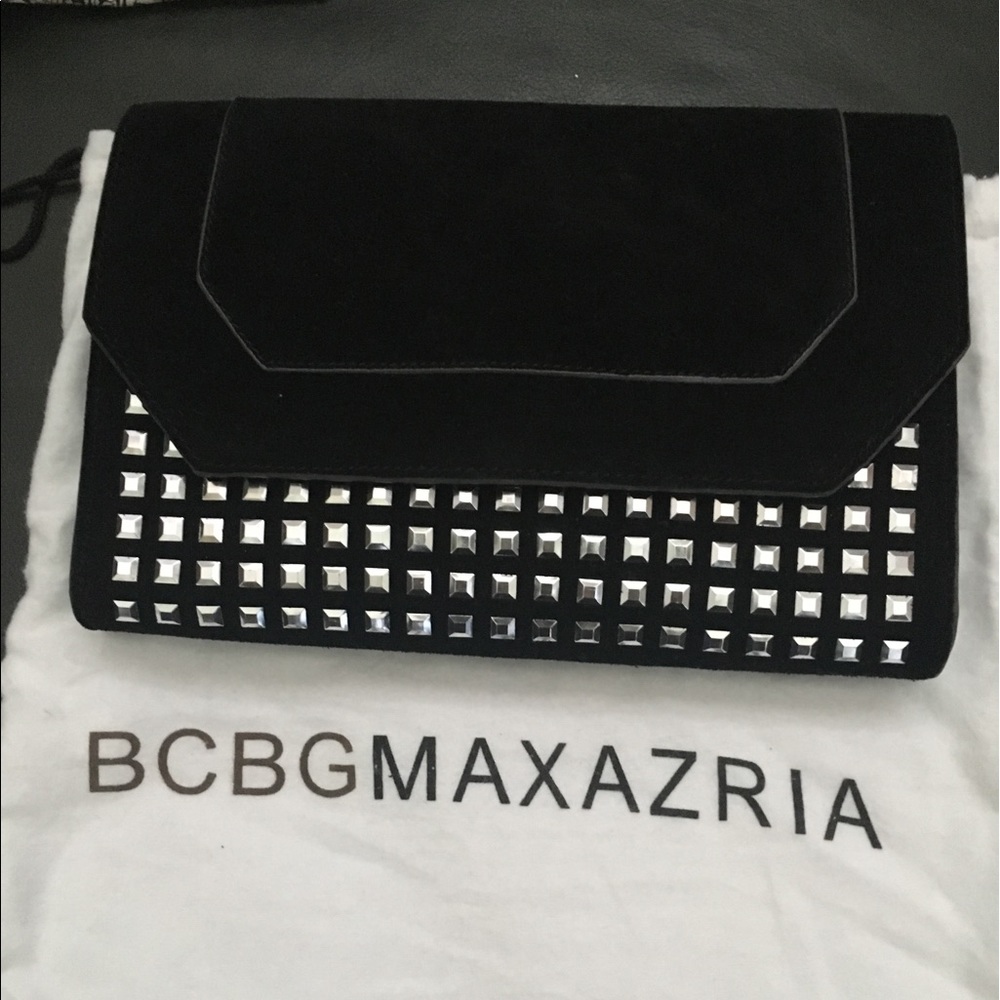 NWOT BCBG clutch excellent condition 10”x7”x1”